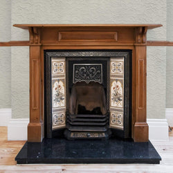 Anaglypta Luxury Vinyl Boyden - RD920 wallpaper around a traditional victorian fireplace